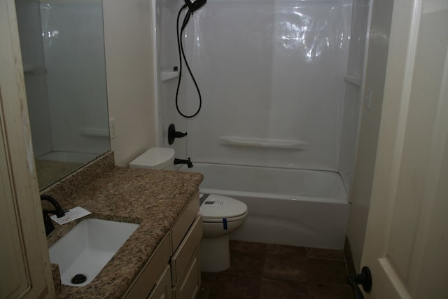 full bathroom with tile patterned flooring, shower / tub combination, vanity, and toilet