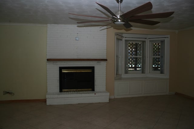 unfurnished living room with crown molding, a fireplace, and a textured ceiling