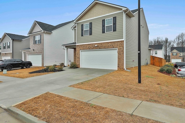 traditional-style home with an attached garage, brick siding, fence, concrete driveway, and a residential view