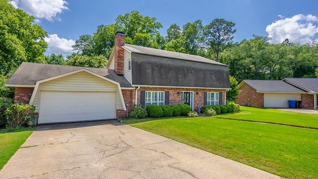 438 Newport Pl, Columbus, GA 31904 - colonial inspired home featuring brick siding, a front lawn, an attached garage, concrete driveway, and a chimney