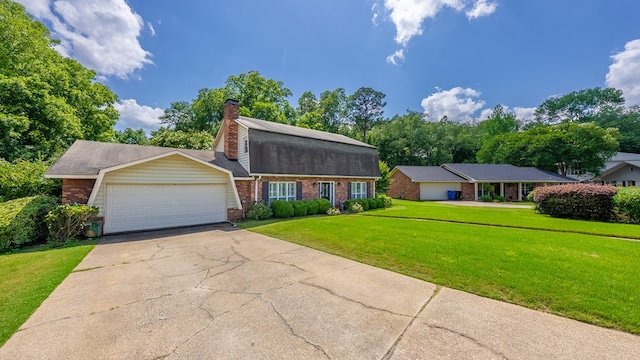 438 Newport Pl, Columbus, GA 31904 - dutch colonial with brick siding, a front yard, an attached garage, concrete driveway, and a chimney