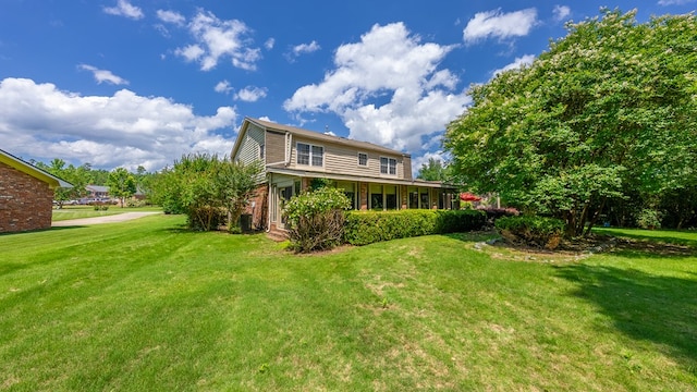 438 Newport Pl, Columbus, GA 31904 - back of house with a yard and brick siding