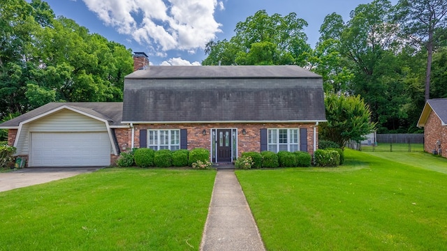 438 Newport Pl, Columbus, GA 31904 - colonial inspired home with brick siding, a shingled roof, and a garage