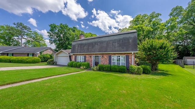 438 Newport Pl, Columbus, GA 31904 - dutch colonial featuring brick siding, an attached garage, concrete driveway, a chimney, and roof with shingles