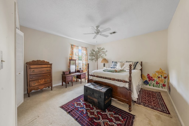 438 Newport Pl, Columbus, GA 31904 - carpeted bedroom with ceiling fan, a textured ceiling, and baseboards