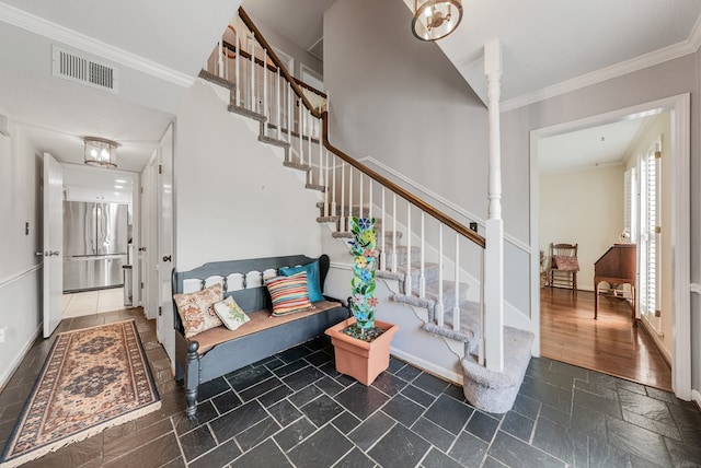 438 Newport Pl, Columbus, GA 31904 - stairway with stone tile floors, crown molding, and baseboards