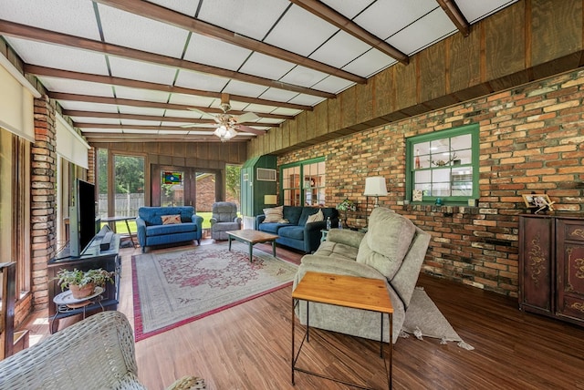 438 Newport Pl, Columbus, GA 31904 - living room featuring brick wall, ceiling fan, wood finished floors, and wooden walls