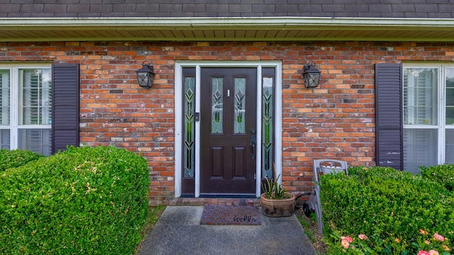 438 Newport Pl, Columbus, GA 31904 - doorway to property featuring brick siding and a shingled roof