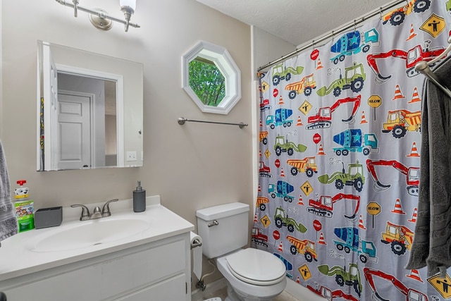 6538 Middleburg Dr, Columbus, GA 31909 - full bathroom with toilet, vanity, curtained shower, and a textured ceiling