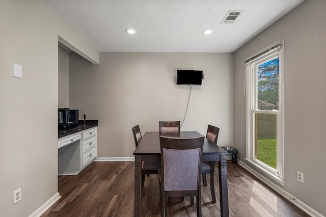 6538 Middleburg Dr, Columbus, GA 31909 - dining room featuring dark wood-style floors, baseboards, recessed lighting, and a textured ceiling
