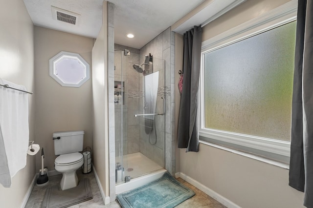 6538 Middleburg Dr, Columbus, GA 31909 - bathroom featuring a shower stall, baseboards, and toilet