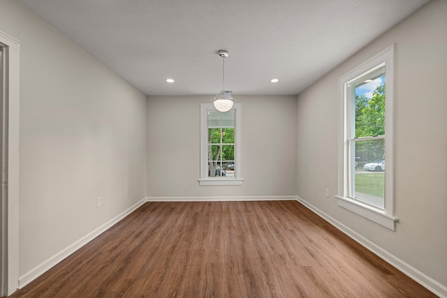 1712 39th St, Phenix City, AL 36867 - spare room featuring wood finished floors and recessed lighting