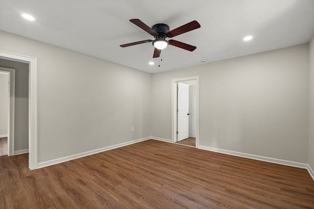 1712 39th St, Phenix City, AL 36867 - unfurnished room with dark wood-style flooring, a ceiling fan, and recessed lighting