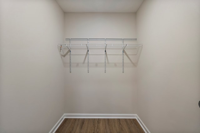 1712 39th St, Phenix City, AL 36867 - walk in closet featuring dark wood finished floors