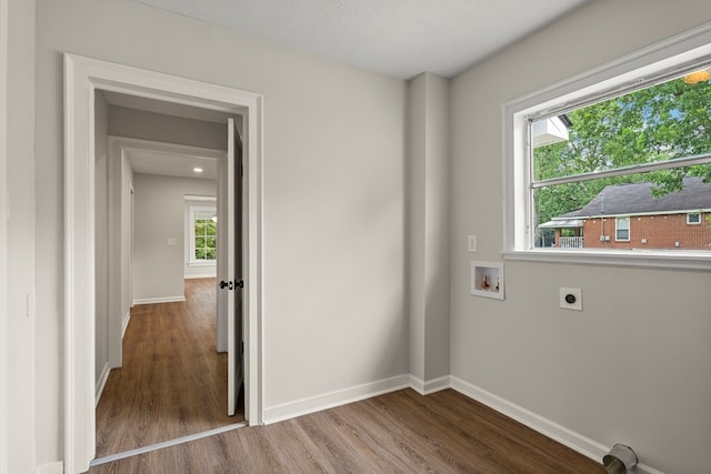 1712 39th St, Phenix City, AL 36867 - laundry room with electric dryer hookup, wood finished floors, and hookup for a washing machine
