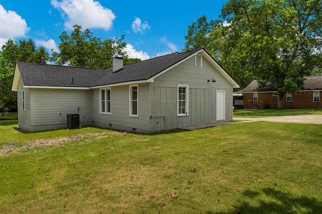 1712 39th St, Phenix City, AL 36867 - view of property exterior featuring crawl space, a yard, a chimney, concrete driveway, and a shingled roof