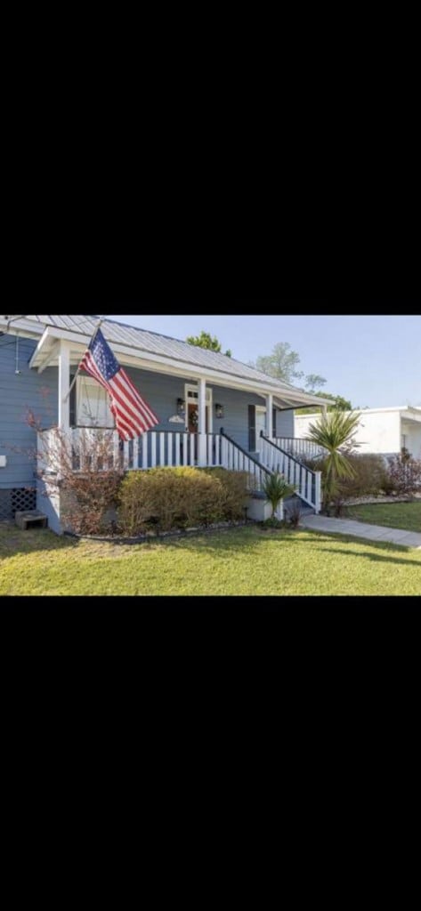 1314 Talbotton Rd, Columbus, GA 31901 - view of front facade with a front yard