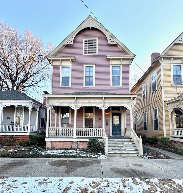 view of front of home featuring covered porch