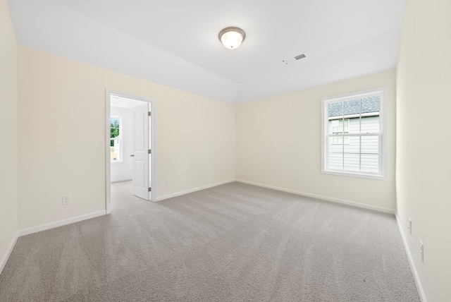 2276 Webbed Way, Opelika, AL 36804 - carpeted spare room with baseboards and vaulted ceiling