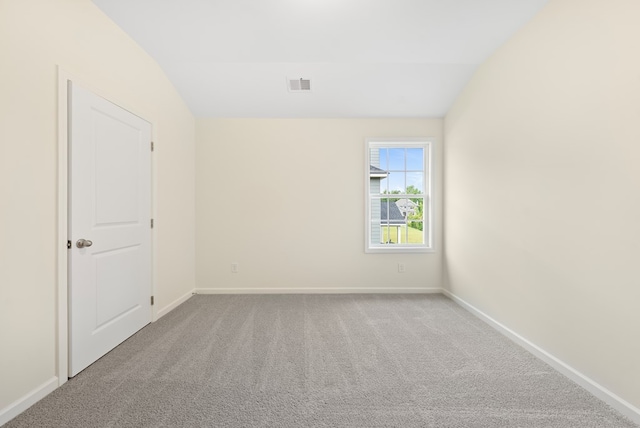 2276 Webbed Way, Opelika, AL 36804 - unfurnished room featuring carpet and vaulted ceiling