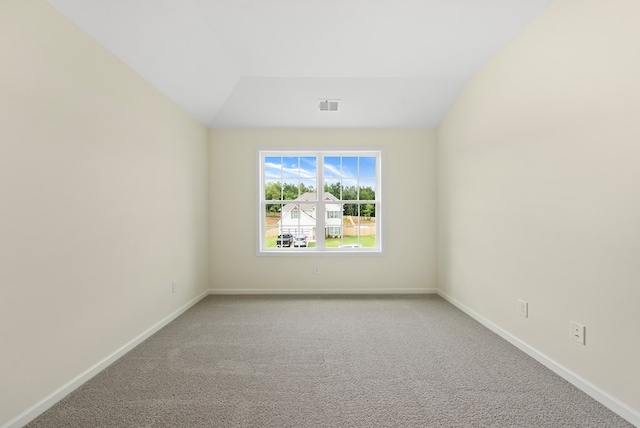 2276 Webbed Way, Opelika, AL 36804 - unfurnished room with light colored carpet and vaulted ceiling