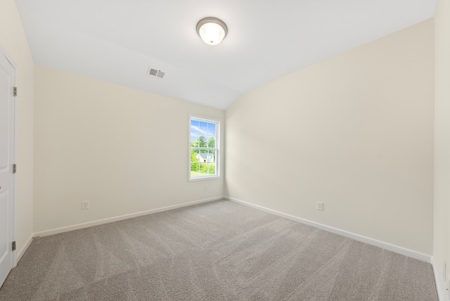 2276 Webbed Way, Opelika, AL 36804 - carpeted spare room featuring baseboards and vaulted ceiling