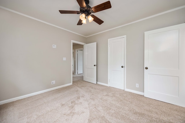 1402 41st St, Columbus, GA 31904 - unfurnished bedroom featuring carpet floors, ornamental molding, baseboards, and a ceiling fan