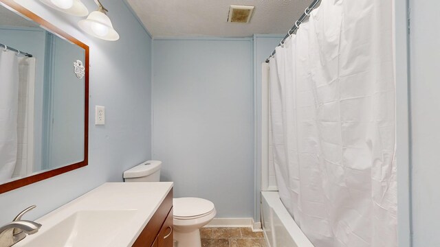 full bathroom featuring vanity, baseboards, visible vents, a textured ceiling, and toilet