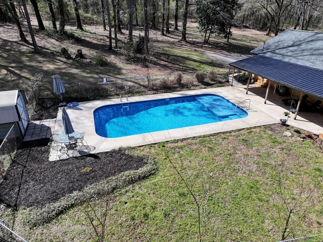 pool with a patio area