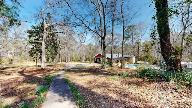 view of road with a view of trees