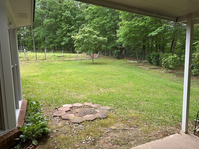 view of yard featuring fence