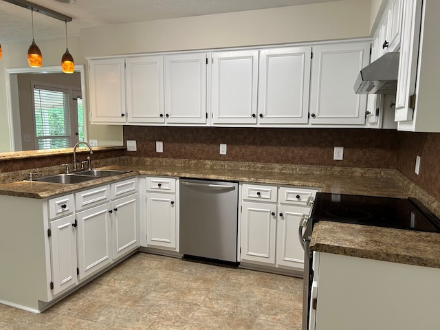 kitchen with white cabinets, dark countertops, appliances with stainless steel finishes, a sink, and range hood