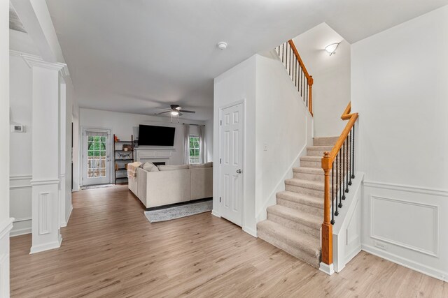 918 Dawkins Ct, Phenix City, AL 36869 - foyer featuring ornate columns, ceiling fan, stairway, healthy amount of natural light, and a decorative wall