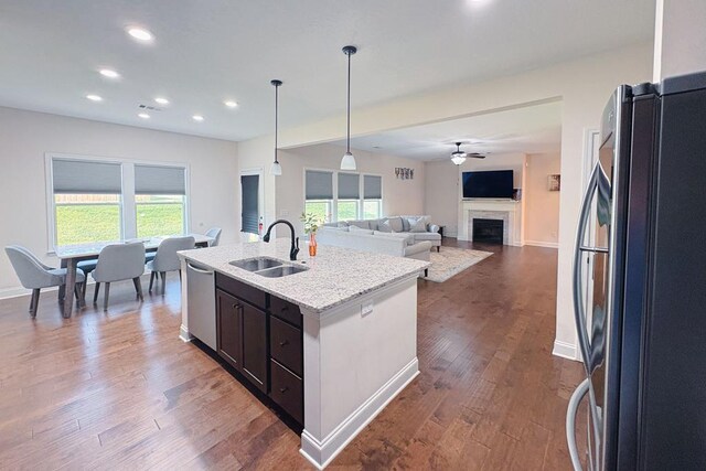239 Clearbrook Ln, Columbus, GA 31904 - kitchen with freestanding refrigerator, dishwasher, a sink, dark wood finished floors, and healthy amount of natural light