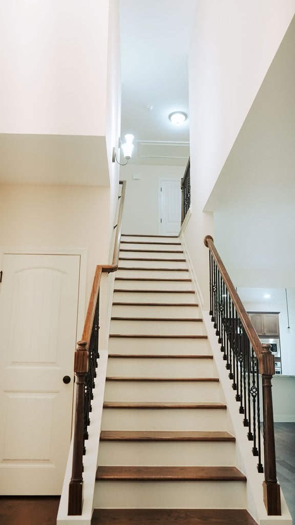 239 Clearbrook Ln, Columbus, GA 31904 - stairs featuring wood finished floors