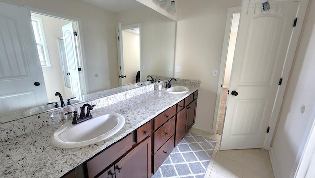 239 Clearbrook Ln, Columbus, GA 31904 - full bath with double vanity, tile patterned flooring, and baseboards