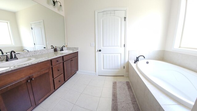 239 Clearbrook Ln, Columbus, GA 31904 - bathroom featuring tile patterned floors, double vanity, and a bath