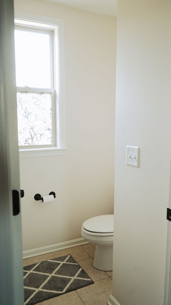 239 Clearbrook Ln, Columbus, GA 31904 - bathroom featuring toilet, tile patterned flooring, and baseboards