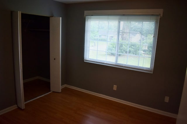 5045 Old Post Rd, Columbus, GA 31909 - unfurnished bedroom with wood finished floors and a closet