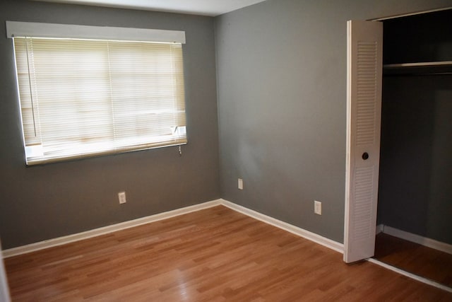 5045 Old Post Rd, Columbus, GA 31909 - unfurnished bedroom featuring wood finished floors and a closet