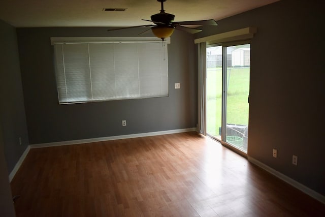 5045 Old Post Rd, Columbus, GA 31909 - empty room with a ceiling fan and wood finished floors