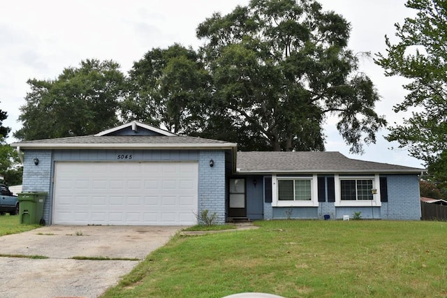 5045 Old Post Rd, Columbus, GA 31909 - ranch-style home featuring brick siding, concrete driveway, and a front lawn