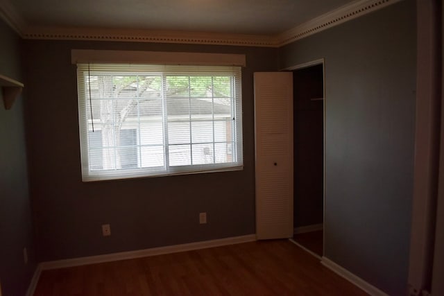 5045 Old Post Rd, Columbus, GA 31909 - unfurnished bedroom featuring a closet and wood finished floors