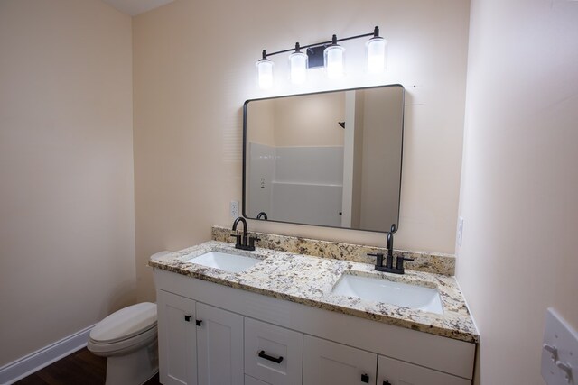 923 Omega Dr, Columbus, GA 31907 - bathroom featuring double vanity and toilet