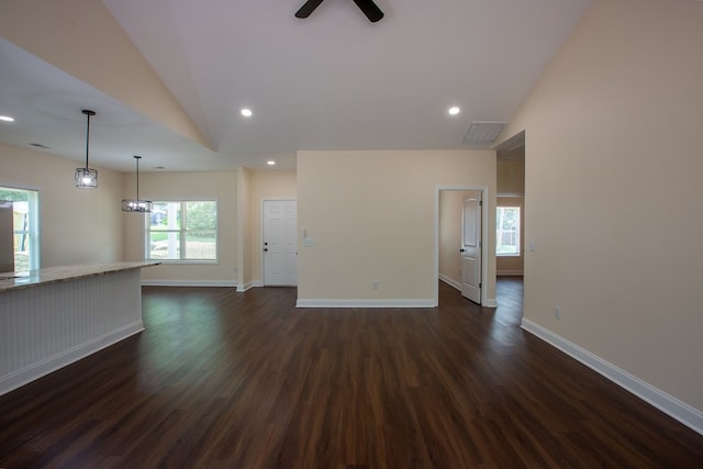 923 Omega Dr, Columbus, GA 31907 - unfurnished living room with dark wood-type flooring, ceiling fan, recessed lighting, and lofted ceiling