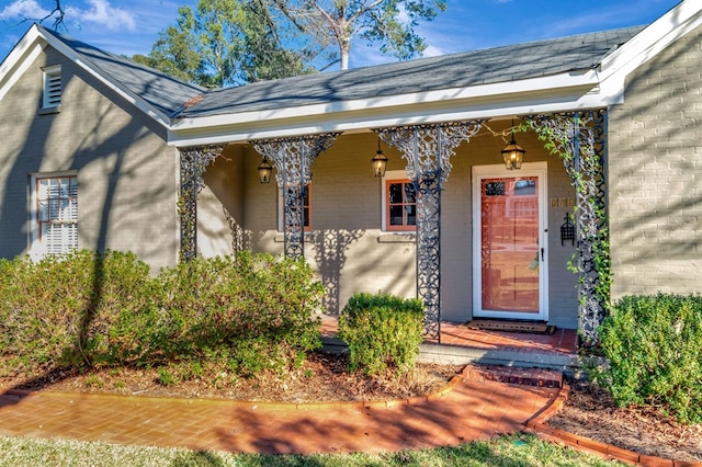 entrance to property with covered porch