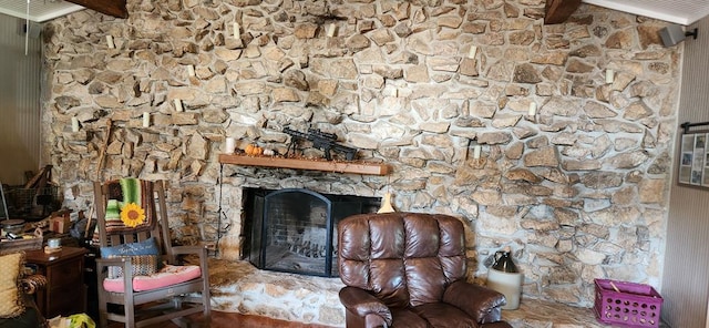 living room featuring a fireplace and beam ceiling