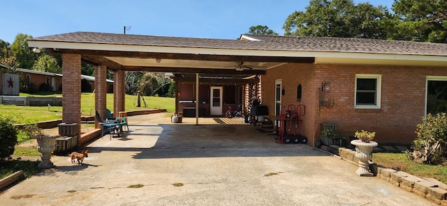 exterior space with a carport