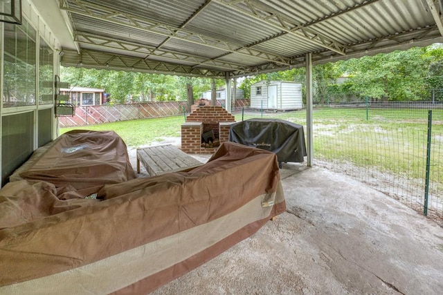 4502 Northwood Ave, Columbus, GA 31907 - fenced backyard with a storage unit and area for grilling