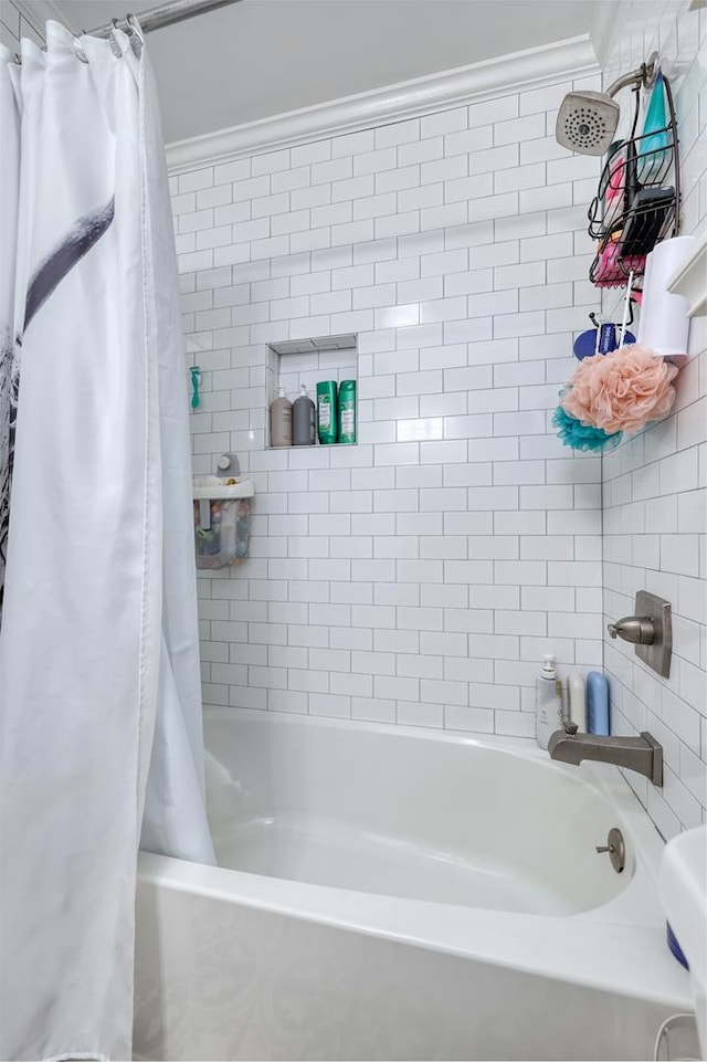 4502 Northwood Ave, Columbus, GA 31907 - bathroom featuring crown molding and shower / bath combo with shower curtain